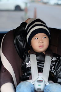 Close-up of boy in car seat
