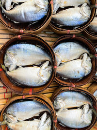 Fish in dim sum basket in the market display