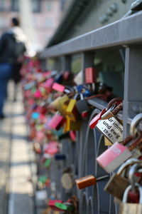 Close-up of padlocks on railing