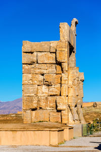 Old ruins against blue sky