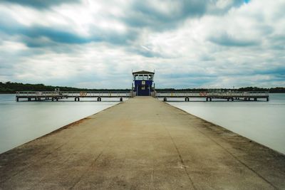 Pier over sea against sky