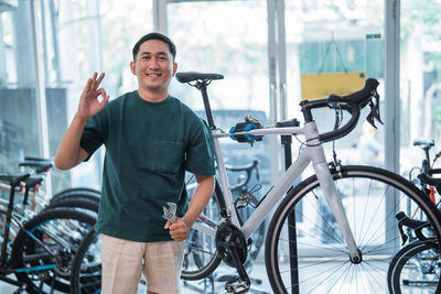 Portrait of man riding bicycles on street