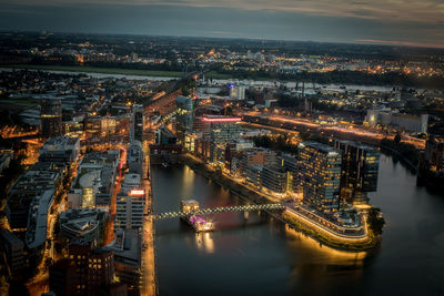 High angle view of illuminated cityscape at night