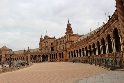 View of historic building against cloudy sky