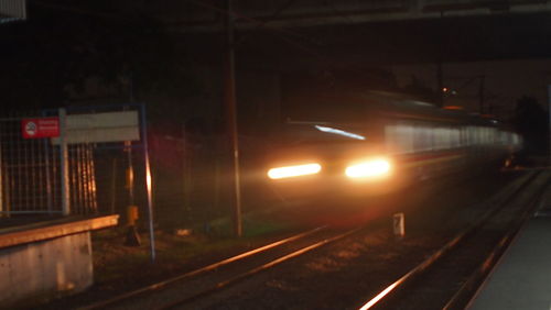 Railroad tracks at night