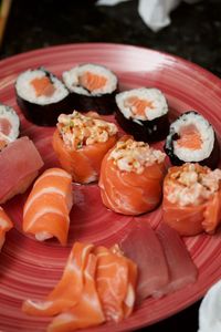 Close-up of sushi served on table