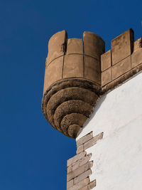 Close-up photo of borj al-hamra in the old medina of asilah