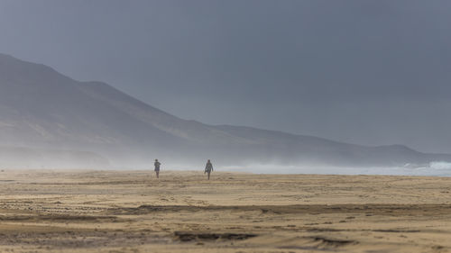 Scenic view of desert against sky