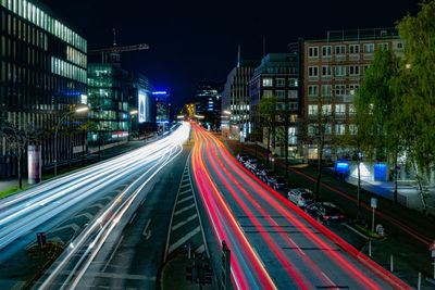 Light trails on city street at night