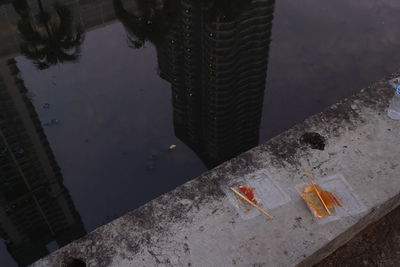 Reflection of buildings in puddle