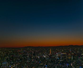 Aerial view of city at night
