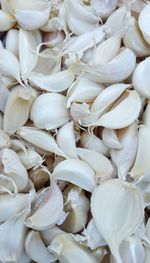 Full frame shot of garlic cloves for sale at market