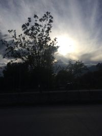 Scenic view of landscape against cloudy sky