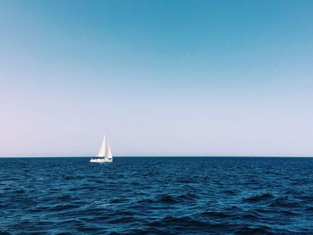 Boat sailing in sea