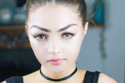 Close-up portrait of young woman