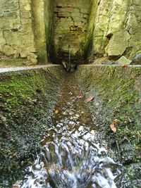 High angle view of water flowing on wall