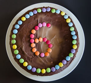 High angle view of multi colored candies on table