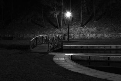 Empty street in park at night