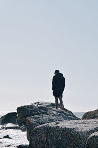 Man standing on rock
