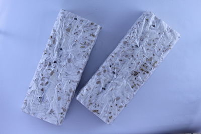 High angle view of white table against blue background