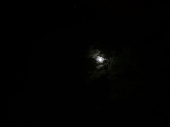 Scenic view of landscape against sky at night