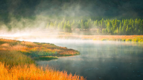 Scenic view of lake against sky,yellowstone wyoming