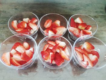 High angle view of strawberries on table