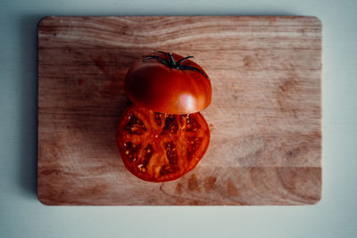 High angle view of apple on cutting board