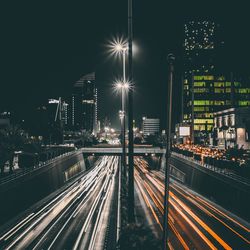 Light trails on city street at night