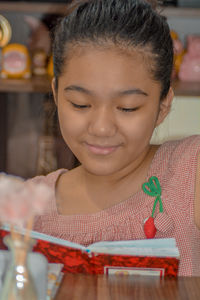 Close-up portrait of a girl looking down