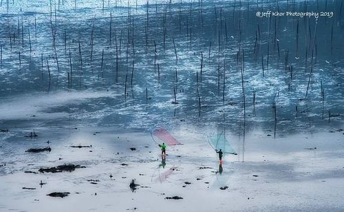 Digital composite image of people skiing on snow