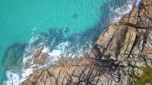 High angle view of waves in sea