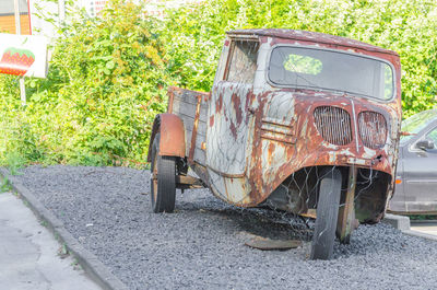 Abandoned car on street