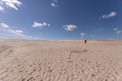 Scenic view of desert against sky