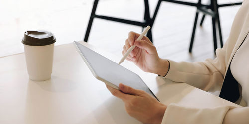 High angle view of woman working on table