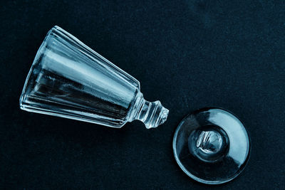 Close-up of light bulb against black background