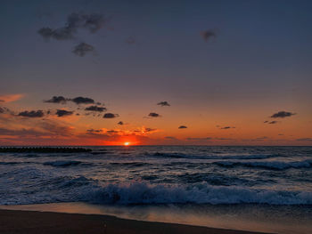 Scenic view of sea against sky during sunset