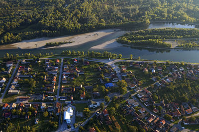 High angle view of river amidst buildings in city