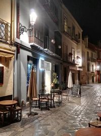 Buildings in city at night