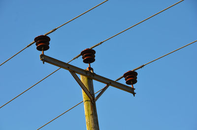 Low angle view of street light against clear sky