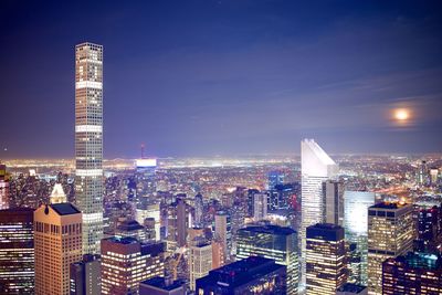 View of city lit up at night