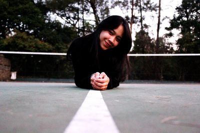 Woman standing in park