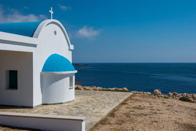 Scenic view of sea against blue sky