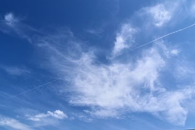 Low angle view of vapor trail in sky