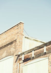 Low angle view of building against clear sky