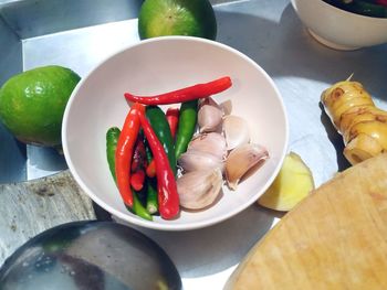 High angle view of fruits in plate on table