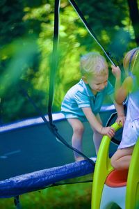 High angle view of boy playing in playground