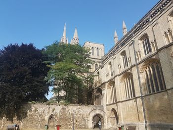 Low angle view of buildings against clear sky