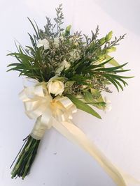 Close-up of white flower vase on table