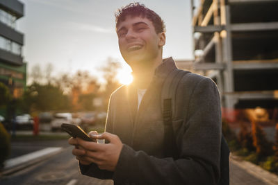 Young man using mobile phone